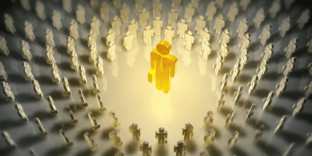 Golden figure standing out in a crowd, symbolizing brand recognition and the impact of brand awareness.