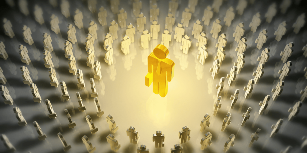 Golden figure standing out in a crowd, symbolizing brand recognition and the impact of brand awareness.